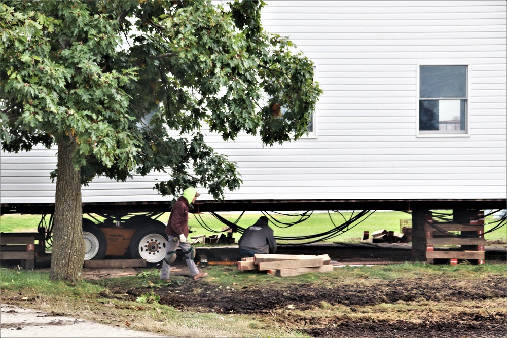 Contractors ‘drive’ World War II-era barracks buildings to new foundations at Fort McCoy