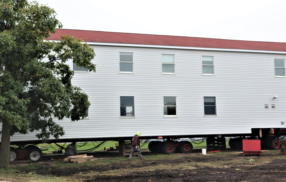 Contractors ‘drive’ World War II-era barracks buildings to new foundations at Fort McCoy