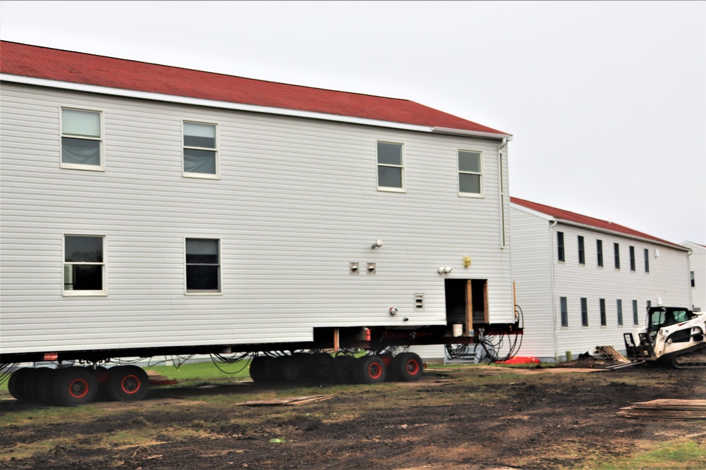 Contractors ‘drive’ World War II-era barracks buildings to new foundations at Fort McCoy