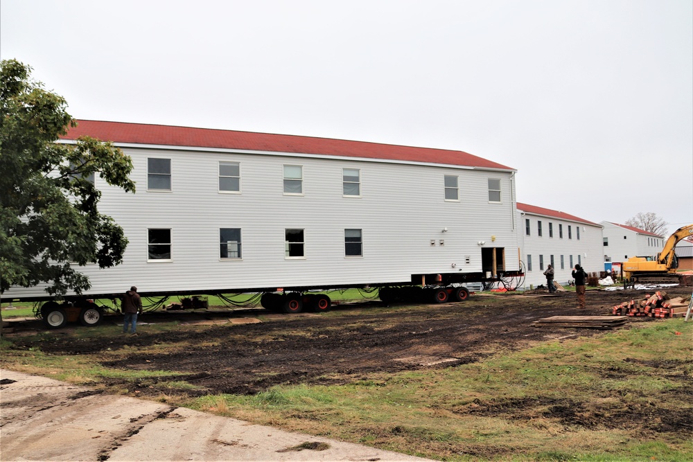 Contractors ‘drive’ World War II-era barracks buildings to new foundations at Fort McCoy