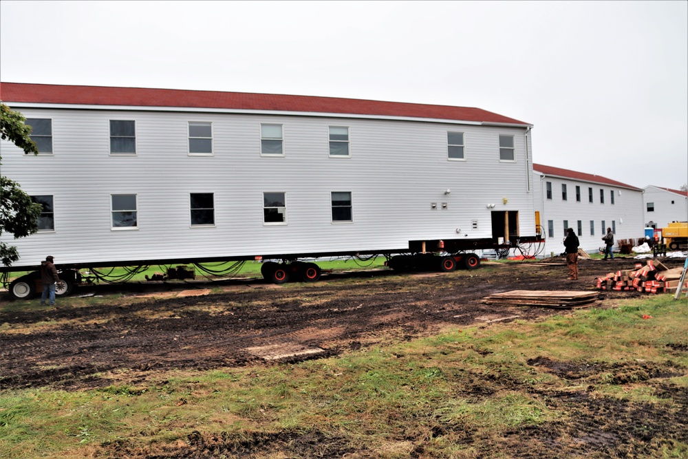 Contractors ‘drive’ World War II-era barracks buildings to new foundations at Fort McCoy