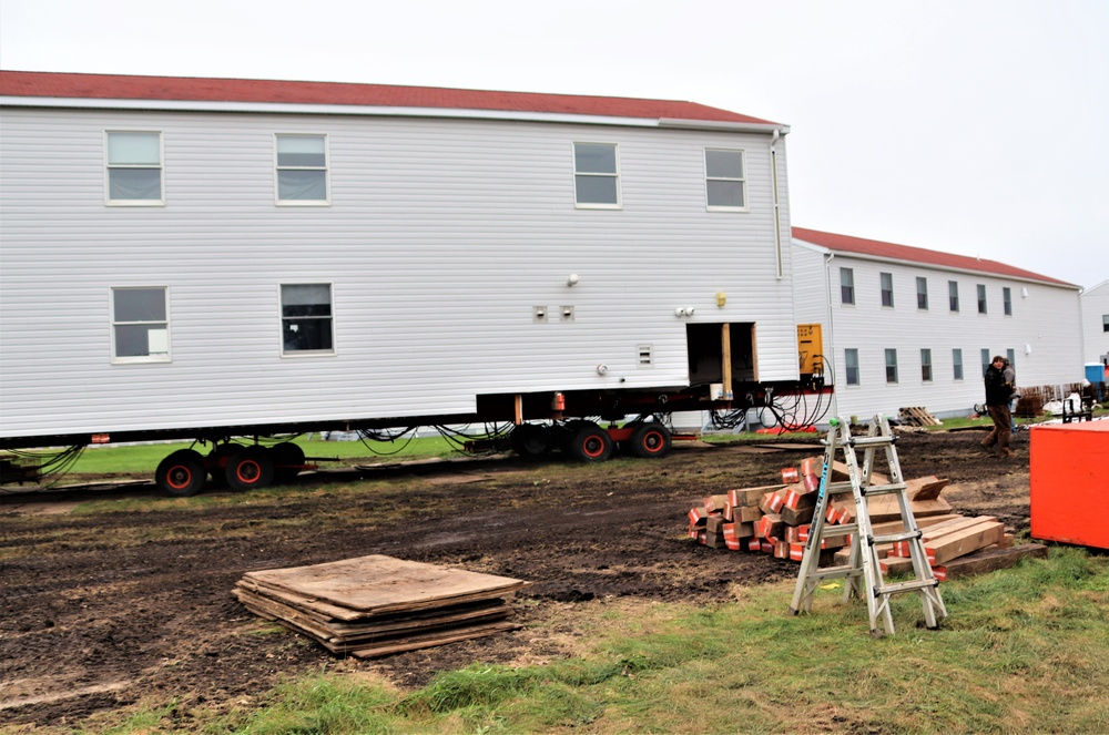 Contractors ‘drive’ World War II-era barracks buildings to new foundations at Fort McCoy