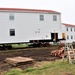 Contractors ‘drive’ World War II-era barracks buildings to new foundations at Fort McCoy