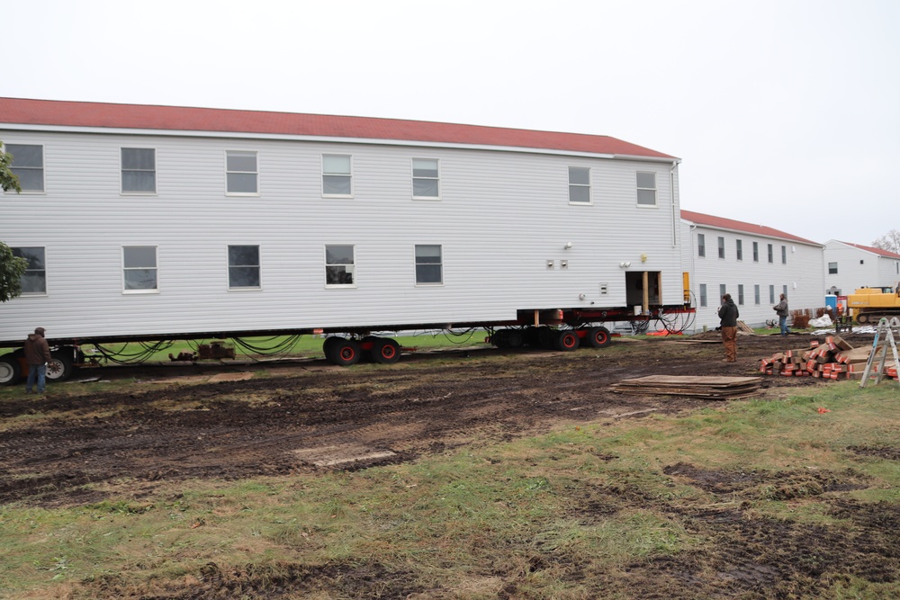 Contractors ‘drive’ World War II-era barracks buildings to new foundations at Fort McCoy