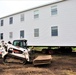 Contractors ‘drive’ World War II-era barracks buildings to new foundations at Fort McCoy