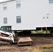 Contractors ‘drive’ World War II-era barracks buildings to new foundations at Fort McCoy