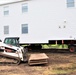 Contractors ‘drive’ World War II-era barracks buildings to new foundations at Fort McCoy