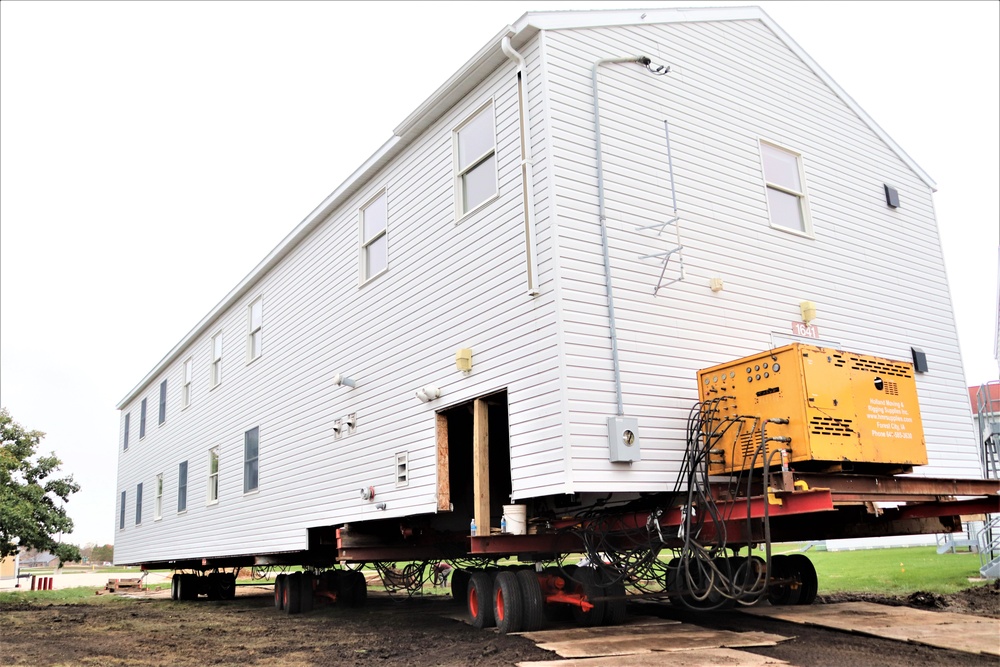 Contractors ‘drive’ World War II-era barracks buildings to new foundations at Fort McCoy