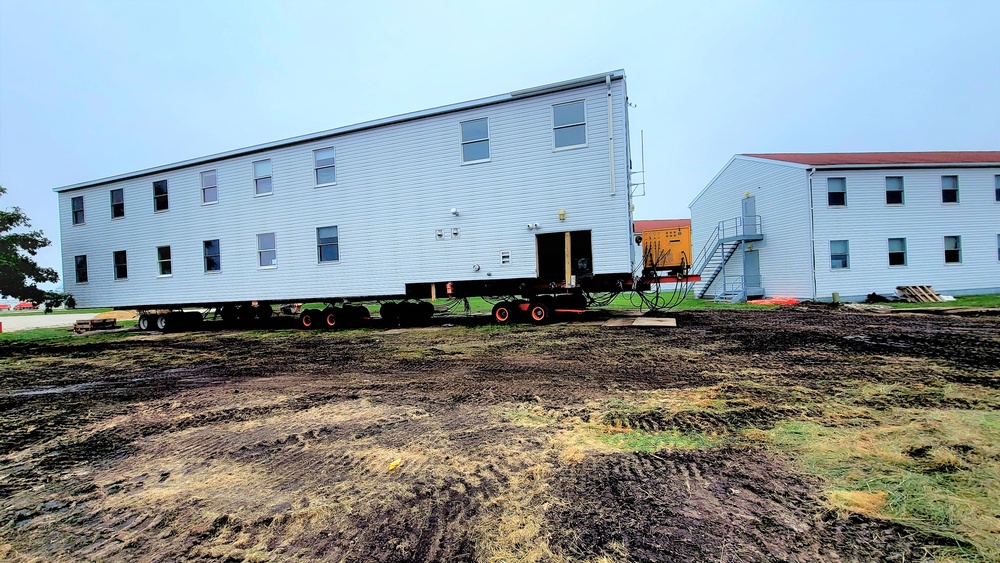 Contractors ‘drive’ World War II-era barracks buildings to new foundations at Fort McCoy