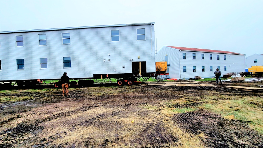 Contractors ‘drive’ World War II-era barracks buildings to new foundations at Fort McCoy