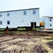 Contractors ‘drive’ World War II-era barracks buildings to new foundations at Fort McCoy