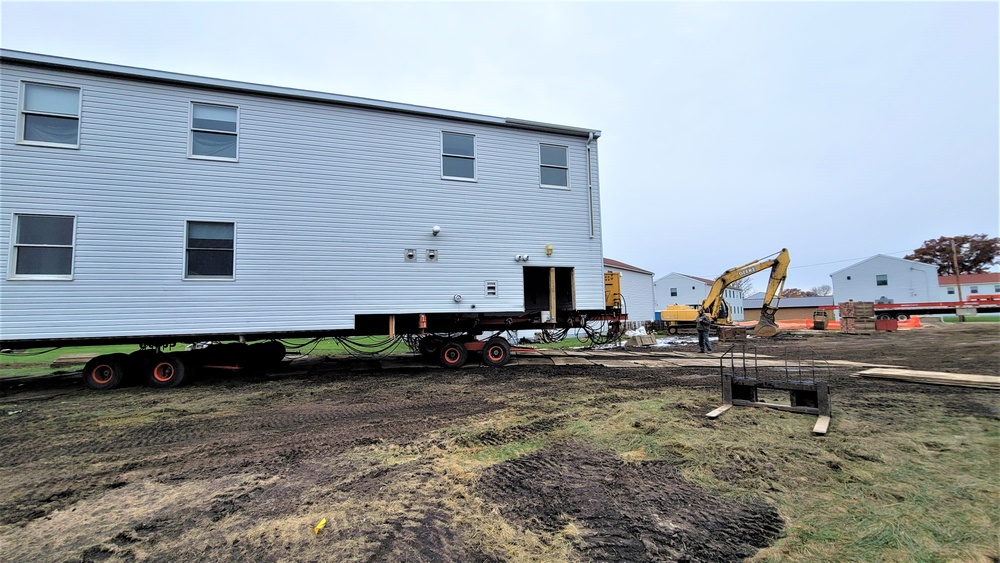 Contractors ‘drive’ World War II-era barracks buildings to new foundations at Fort McCoy