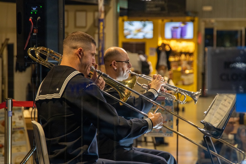U.S. SEVENTH Fleet Band's Shonan Brass Quintet performs at the Yokosuka Port Market.