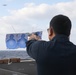 Sailors aboard the USS Rafael Peralta (DDG 115) conduct a small arms shoot in the East China Sea