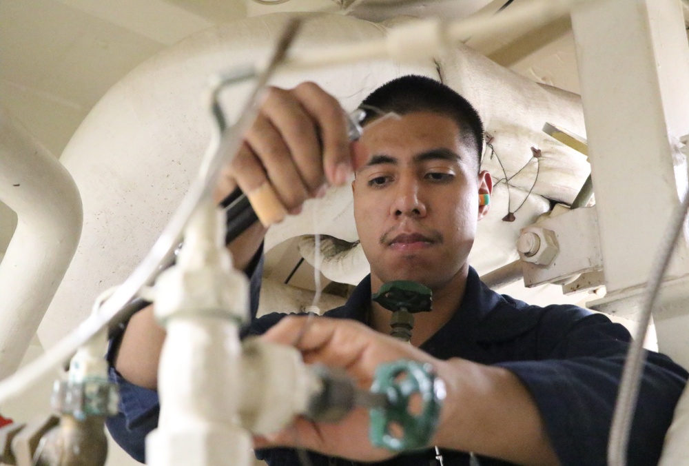 USS Stethem Sailor Performs Preventative Maintenance