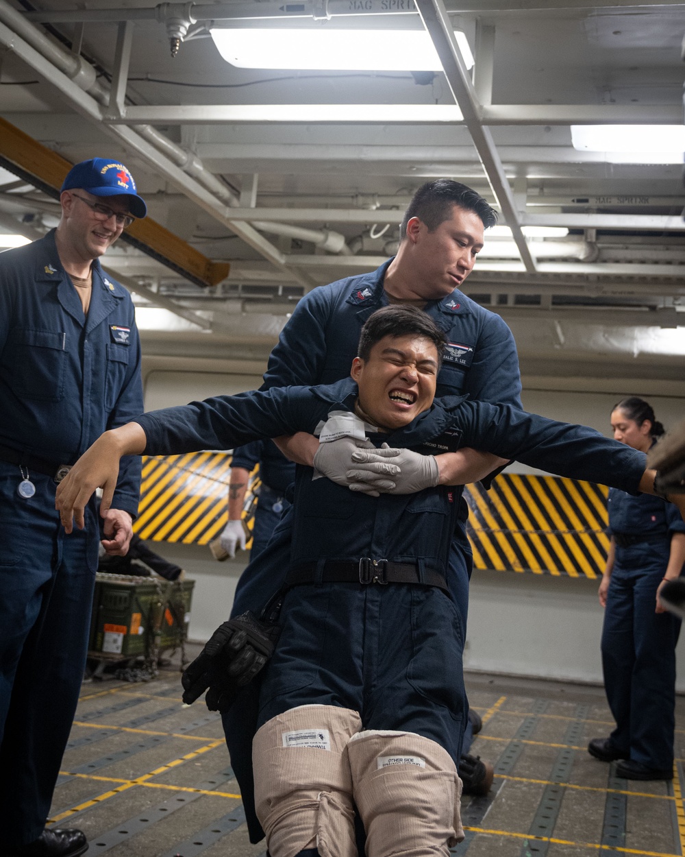 USS Ronald Reagan (CVN 76) Sailors conduct mass casualty drill