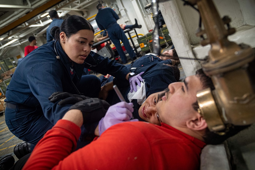 USS Ronald Reagan (CVN 76) Sailors conduct mass casualty drill