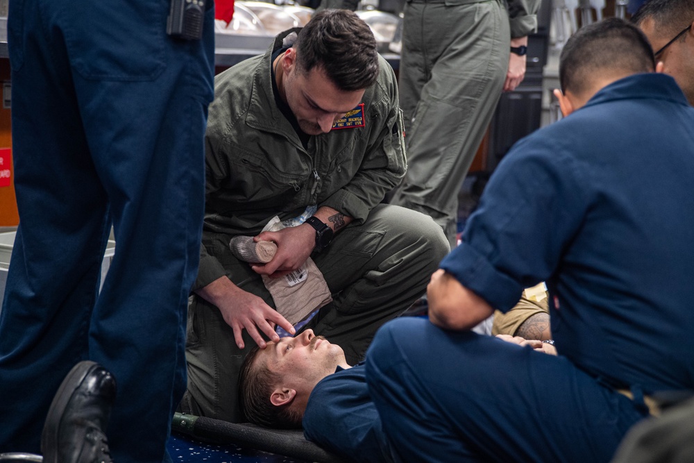 USS Ronald Reagan (CVN 76) Sailors conduct mass casualty drill