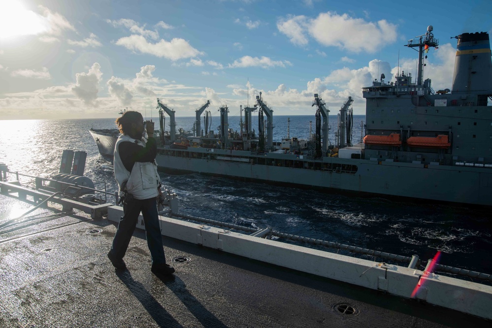 USS Ronald Reagan (CVN 76) conducts fueling-at-sea with USNS Big Horn (T-AO 198)