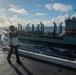 USS Ronald Reagan (CVN 76) conducts fueling-at-sea with USNS Big Horn (T-AO 198)