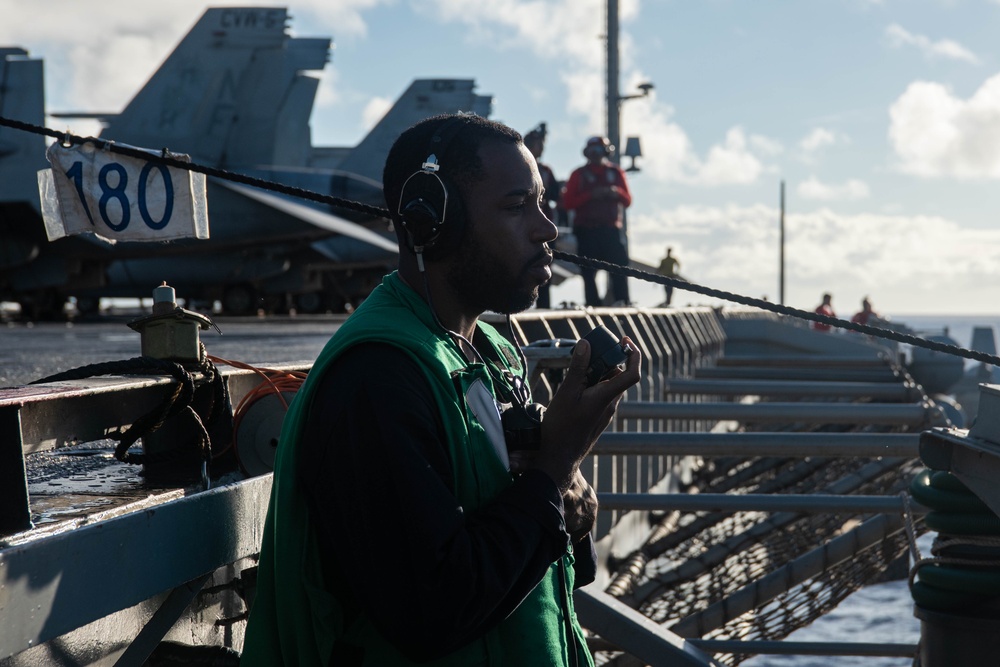 USS Ronald Reagan (CVN 76) conducts fueling-at-sea with USNS Big Horn (T-AO 198)