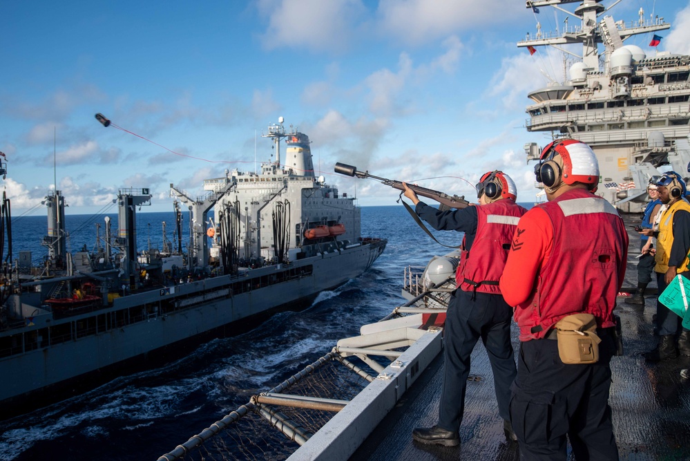 USS Ronald Reagan (CVN 76) conducts fueling-at-sea with USNS Big Horn (T-AO 198)