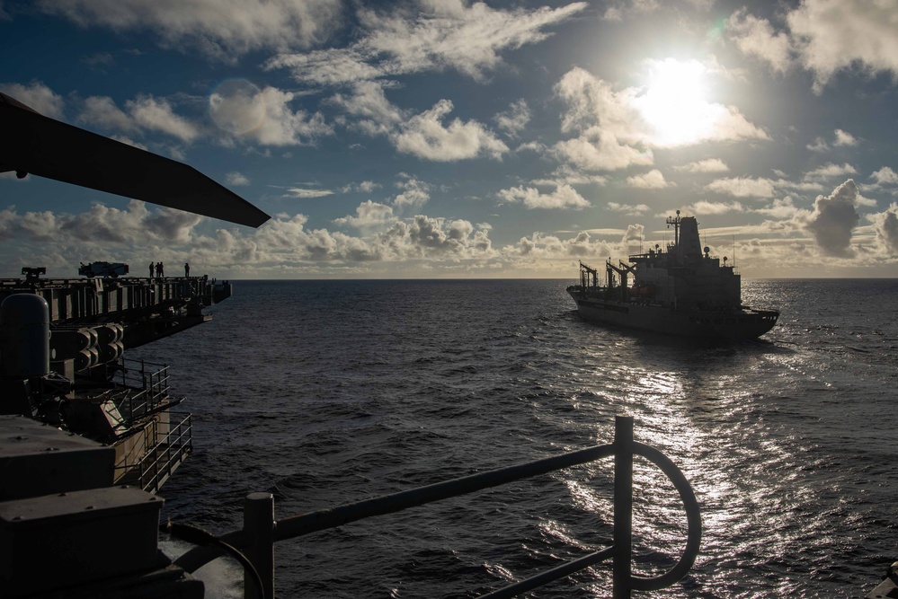 USS Ronald Reagan (CVN 76) conducts fueling-at-sea with USNS Big Horn (T-AO 198)