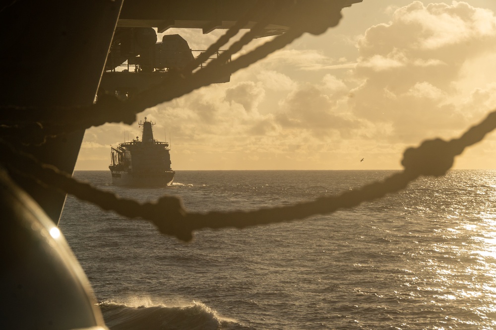 USS Ronald Reagan (CVN 76) conducts fueling-at-sea with USNS Big Horn (T-AO 198)