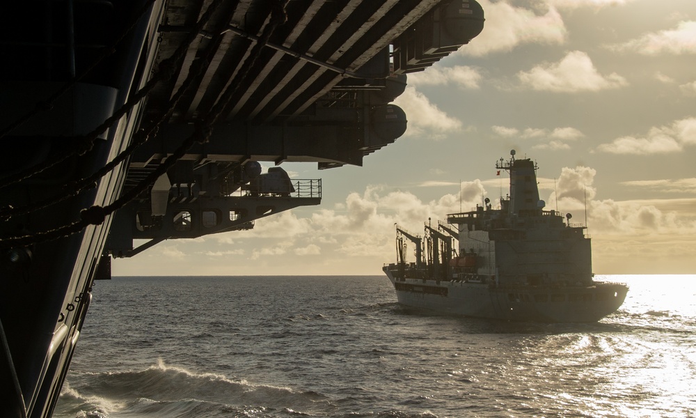 USS Ronald Reagan (CVN 76) conducts fueling-at-sea with USNS Big Horn (T-AO 198)