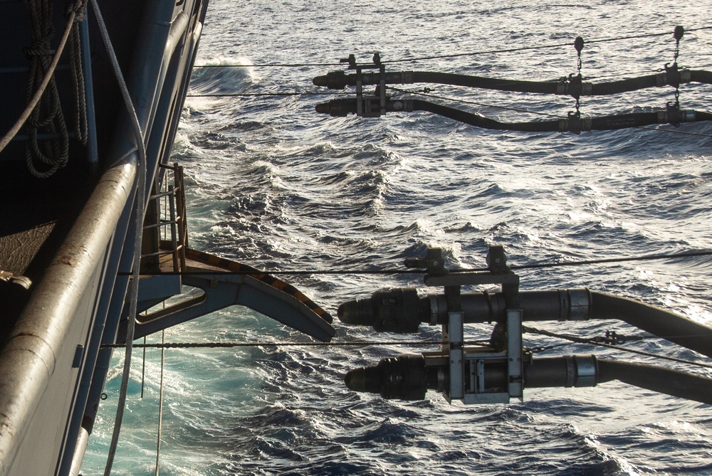 USS Ronald Reagan (CVN 76) conducts fueling-at-sea with USNS Big Horn (T-AO 198)