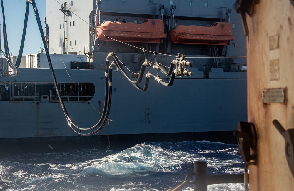 USS Ronald Reagan (CVN 76) conducts fueling-at-sea with USNS Big Horn (T-AO 198)