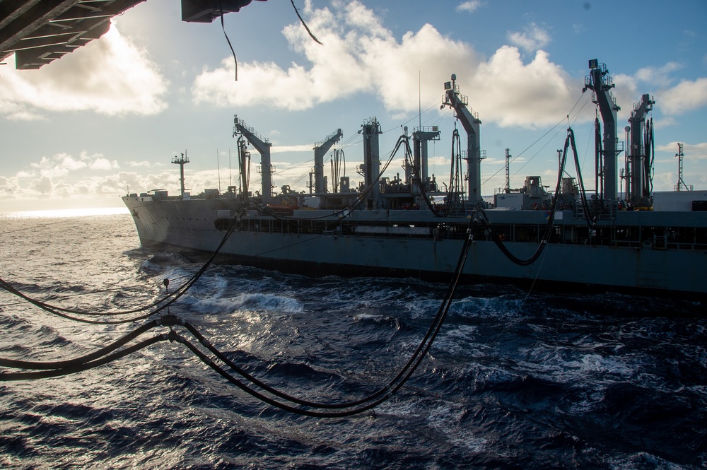 USS Ronald Reagan (CVN 76) conducts fueling-at-sea with USNS Big Horn (T-AO 198)