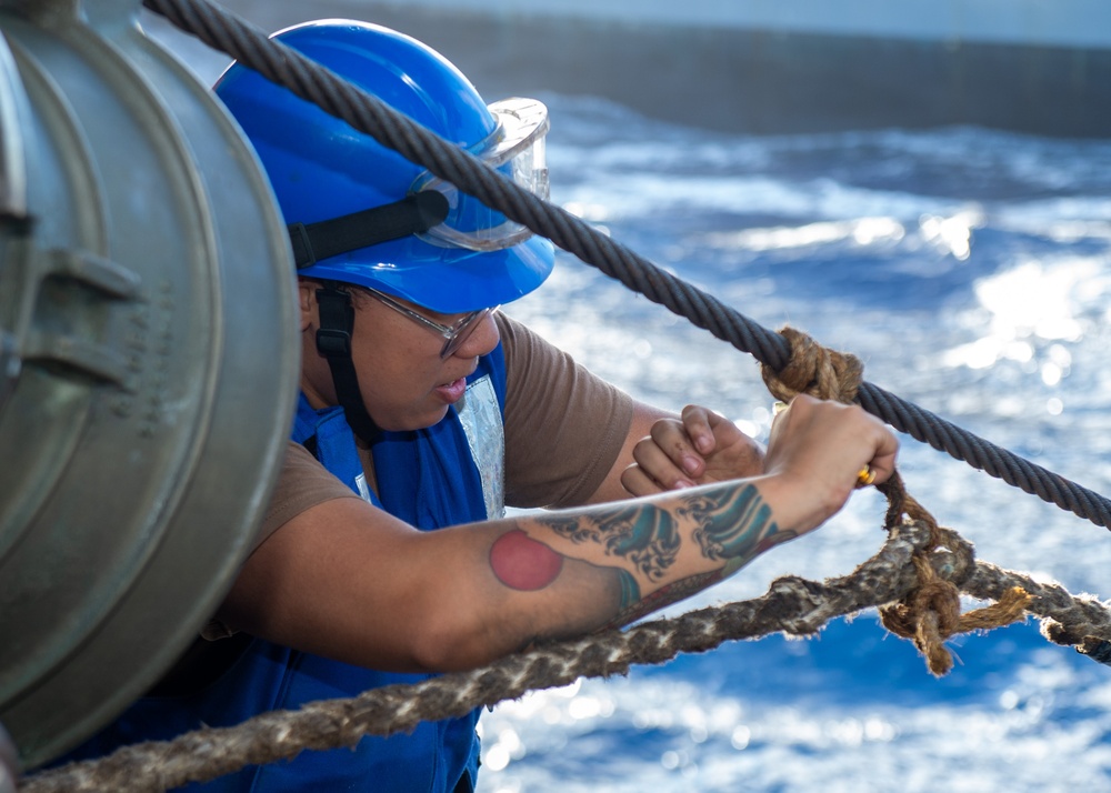 USS Ronald Reagan (CVN 76) conducts fueling-at-sea with USNS Big Horn (T-AO 198)