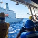 USS Ronald Reagan (CVN 76) conducts fueling-at-sea with USNS Big Horn (T-AO 198)