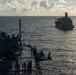 USS Ronald Reagan (CVN 76) conducts fueling-at-sea with USNS Big Horn (T-AO 198)