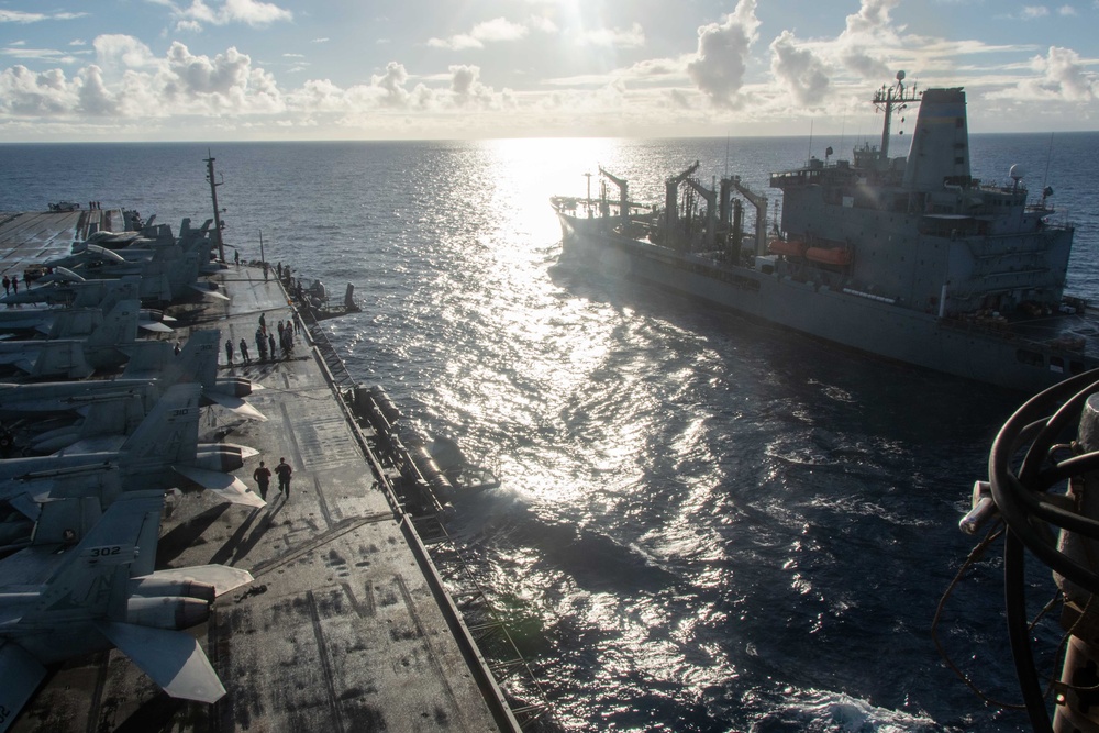 USS Ronald Reagan (CVN 76) conducts fueling-at-sea with USNS Big Horn (T-AO 198)