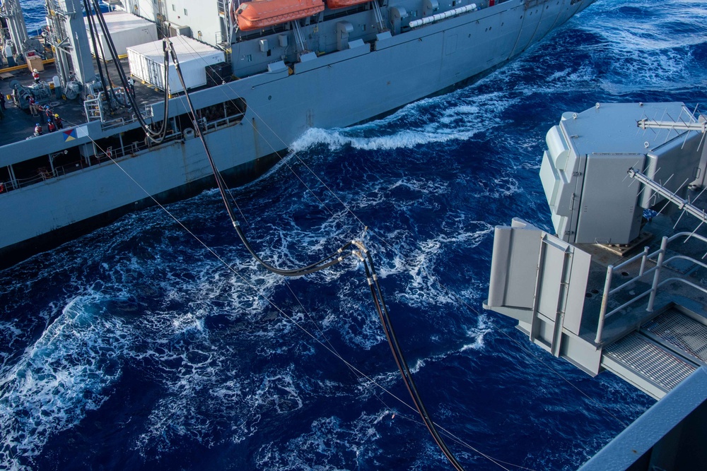 USS Ronald Reagan (CVN 76) conducts fueling-at-sea with USNS Big Horn (T-AO 198)