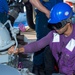 USS Ronald Reagan (CVN 76) conducts fueling-at-sea with USNS Big Horn (T-AO 198)