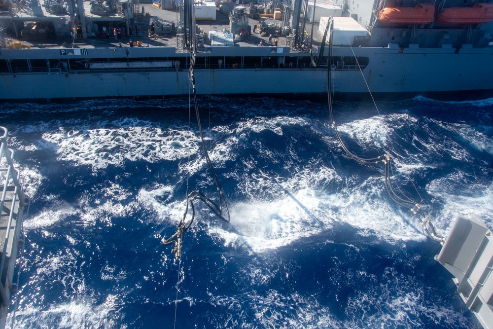 USS Ronald Reagan (CVN 76) conducts fueling-at-sea with USNS Big Horn (T-AO 198)