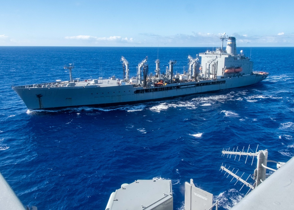 USS Ronald Reagan (CVN 76) conducts fueling-at-sea with USNS Big Horn (T-AO 198)