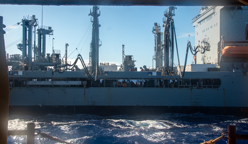 USS Ronald Reagan (CVN 76) conducts fueling-at-sea with USNS Big Horn (T-AO 198)