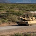 U.S. Army Soldier ground guides M1 Abrams