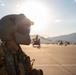 U.S. Army Door Gunner conducts pre-flight checks