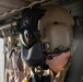 U.S. Army Crew Chief looks off to Door Gunner