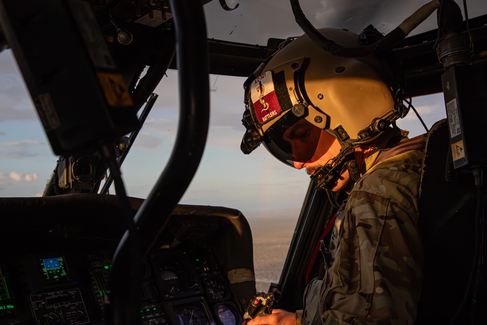 U.S. Army Pilot monitors avionics