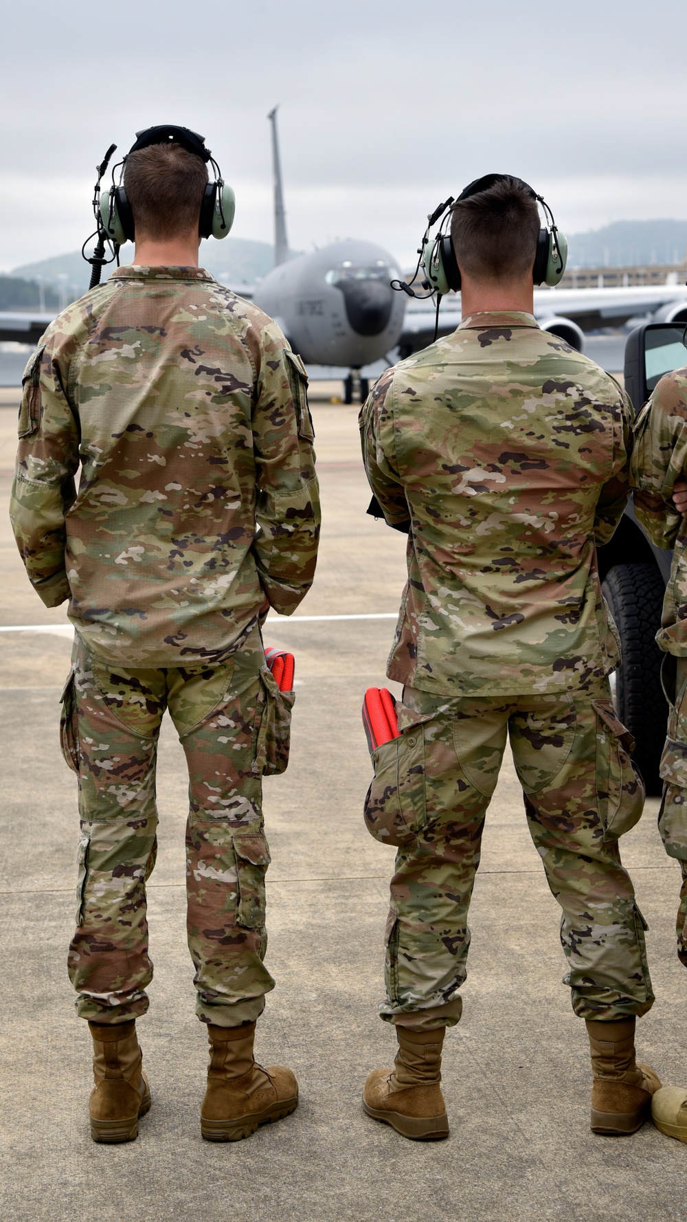 117th AMXS crew chiefs stand by to taxi KC-135 Stratotanker