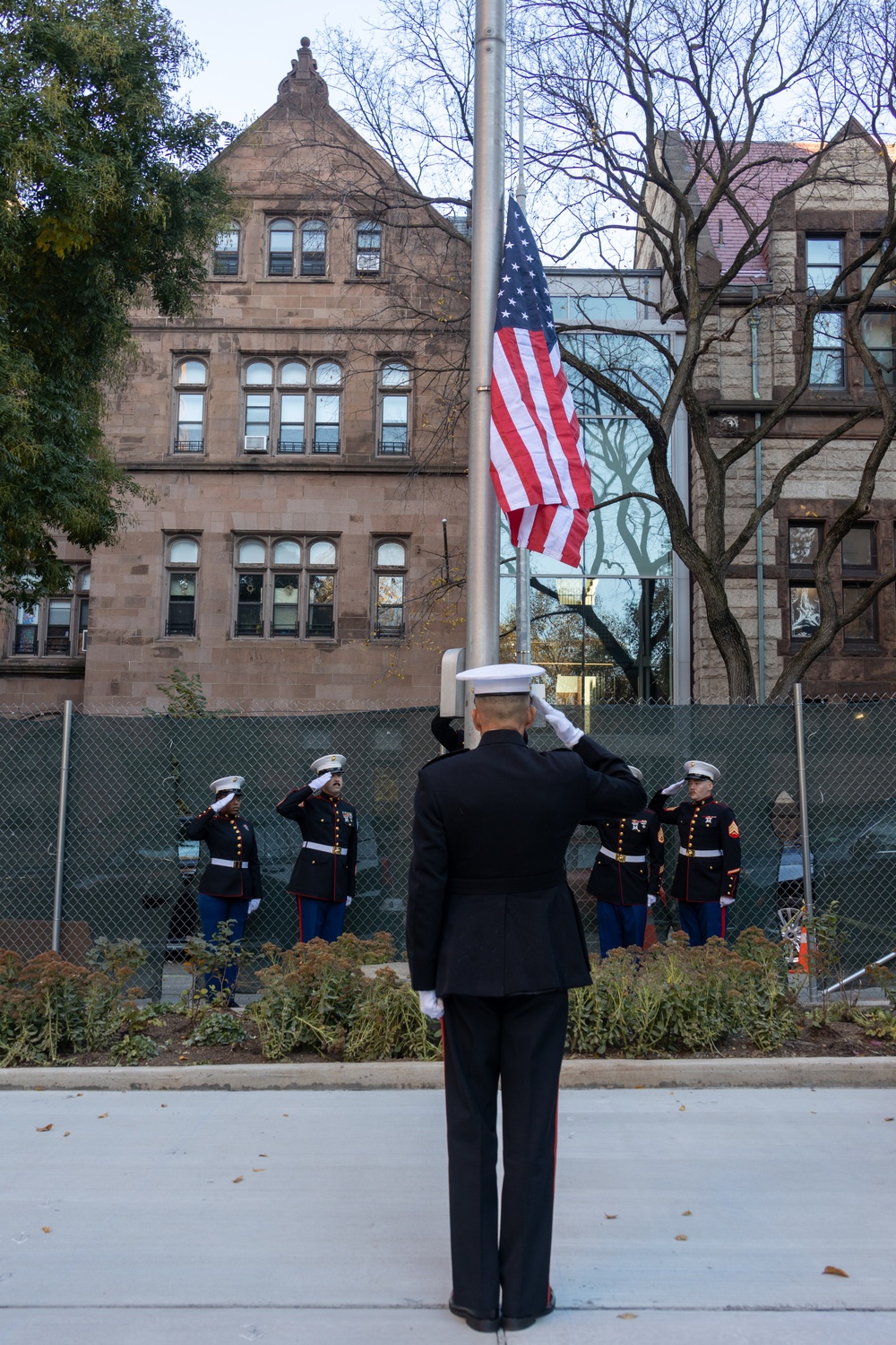 U.S. Marines conduct flag raising ceremony for locale community