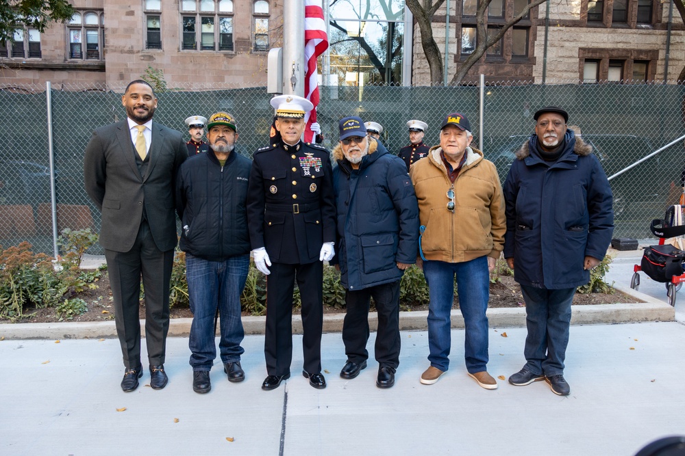 U.S. Marines conduct flag raising ceremony for locale community