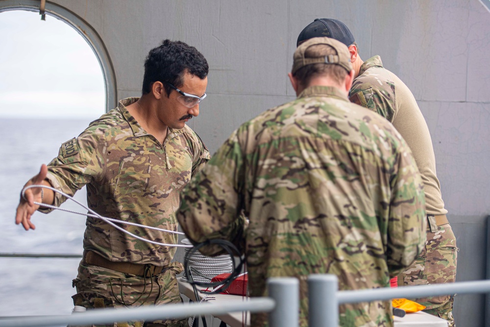 U.S. Navy Explosive Ordnance Disposal Technicians Conduct Demolition Build-Up