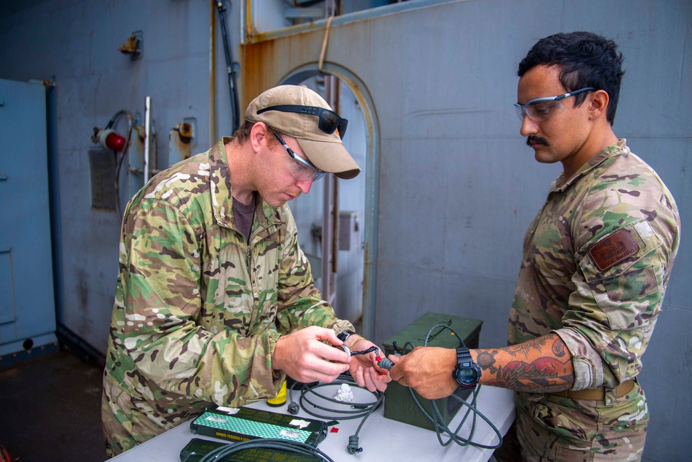 U.S. Navy Explosive Ordnance Disposal Technicians Conduct Demolition Build-Up